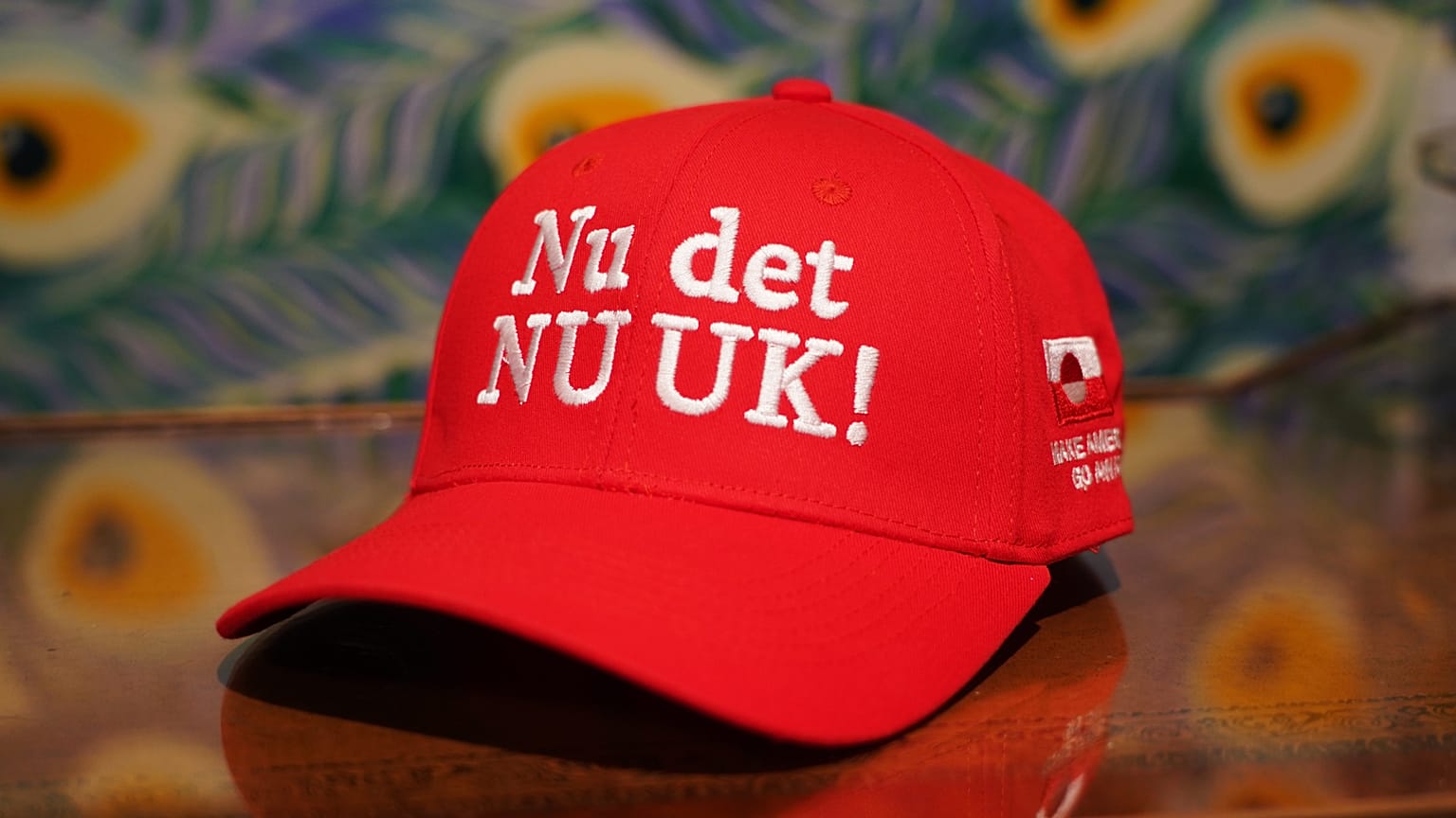 FILE. Red caps with the inscriptions "Make America Go Away "and "NU DET NUUK" have become a symbol of Greenland's resistance to Donald Trump's demands.