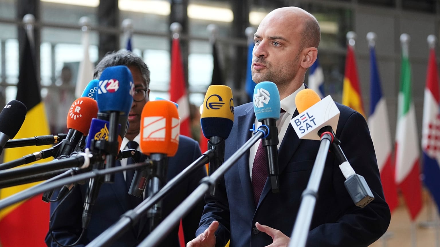 French Foreign Minister Jean-Noel Barrot speaks with the media as he arrives for a meeting of EU foreign ministers at the European Council building in Brussels, June 23, 2025.