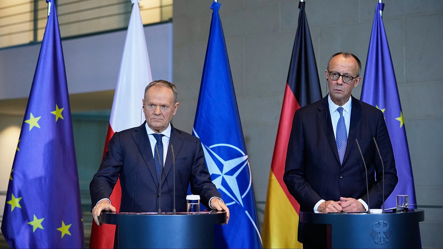 Poland's Prime Minister Donald Tusk, left, and German Chancellor Friedrich Merz attend a joint press conference at the Chancellery in Berlin.