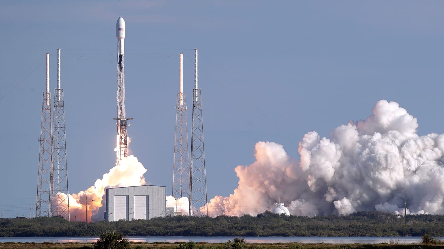 A Falcon 9 SpaceX rocket with a payload of approximately 60 satellites for SpaceX's Starlink broadband network lifts off from Space Launch Complex 40, Wednesday, Jan. 29, 2020