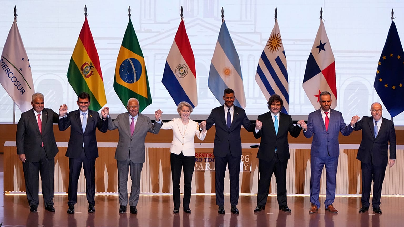Leaders pose for a group photo during a meeting to sign a free trade deal between the European Union and Mercosur in Asuncion, Paraguay, Saturday, Jan. 17, 2026. 