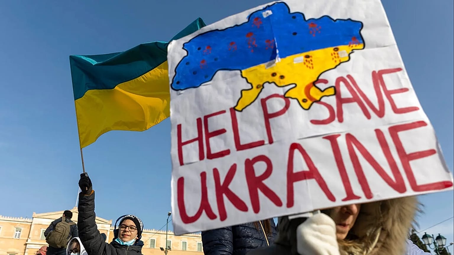 FILE - Protesters take part in a rally against the Russian invasion of Ukraine, at central Syntagma square, in Athens, on Saturday 19 March 2022. 