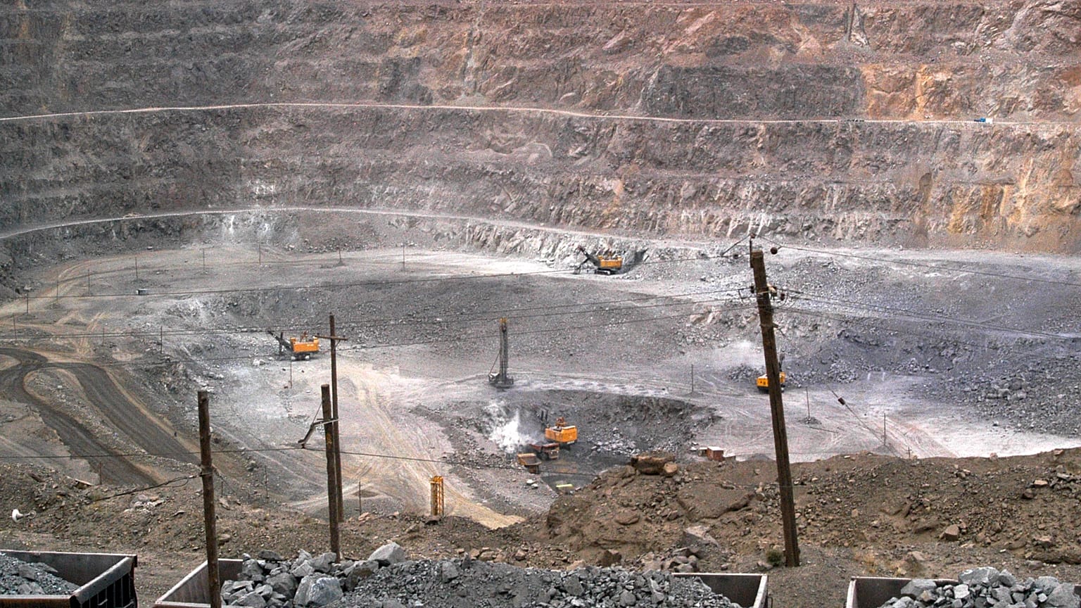 FILE. Workers use machinery to dig at a rare earth mine in Baiyunebo mining district of Baotou in north China's Inner Mongolia Autonomous Region. 2012.