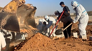 FILE - Victims of the flash flood are buried in Derna, Libya, on Sept. 15, 2023. 