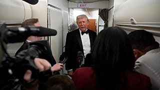 President Donald Trump speaks with reporters aboard Air Force One as he travels from Joint Base Andrews, Md. to West Palm Beach, Fla., Saturday, Jan. 31, 2026