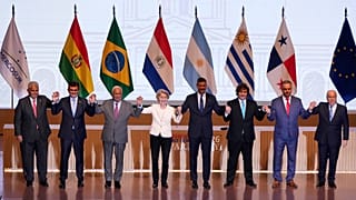 Leaders pose for a group photo during a meeting to sign a free trade deal between the European Union and Mercosur in Asuncion, Paraguay, Saturday, Jan. 17, 2026. 