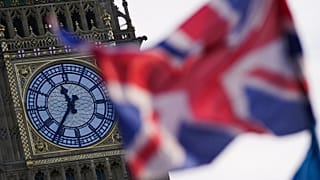 A British flag waves against the backdrop of Big Ben in London, 7 January, 2026