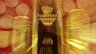 FILE. Gold bullions and bullion coins are seen on this zoomed photo in the German BW-Bank in Stuttgart, Germany. 18 March 2008.