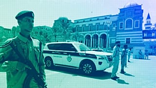 Libyan soldiers guard the Central Bank headquarters in Tripoli, August 2024