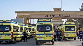 Ambulances line up to enter the Egyptian gate of the Rafah crossing on the way to the Gaza Strip, in Rafah, Egypt, Sunday, Feb. 1, 2026