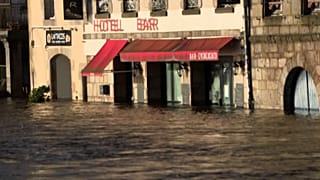 Half submerged restaurant on Quai Surcouff 