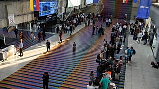 Passengers wait to check in at Simon Bolivar International Airport in Maiquetia, 5 January, 2026