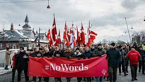 Hundreds of Danish veterans, many of whom fought alongside U.S. troops, stage a silent protest as they march from Kastellet to the American embassy in Copenhagen on Saturday, 