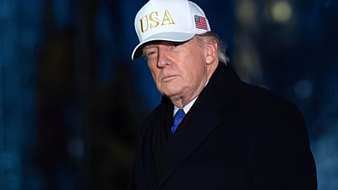 President Donald Trump walks on the South Lawn upon his arrival to the White House, Sunday, Feb. 1, 2026, in Washington.