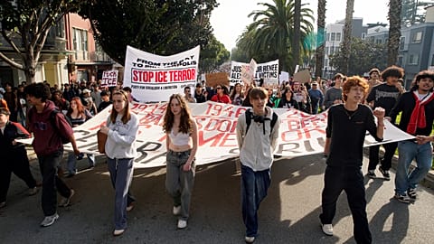 Protestors march to Dolores Park as part of a nationwide shutdown effort in response to the ongoing federal immigration raids and unrest in Minneapolis, in San Francisco