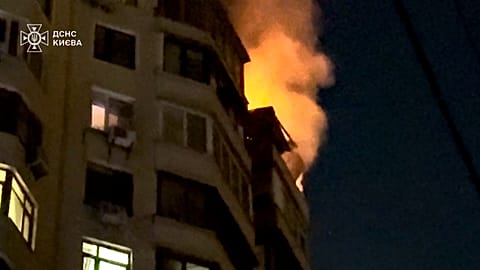 Fire in Kyiv on the top floor of a high-rise building triggered by Russian night-time attacks