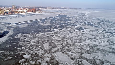 FILE: Ice floes drift in the Baltic Sea near Stralsund, eastern Germany, Sunday, March 4, 2018